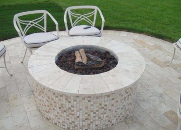 Backyard firepit and patio paving from Paccione & Sons