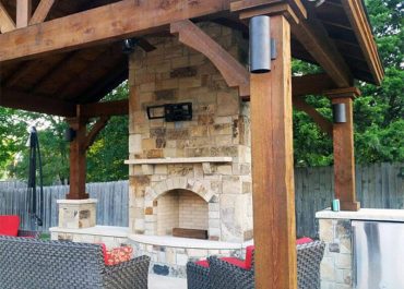 Outdoor fireplace & pergola from Paccione & Sons