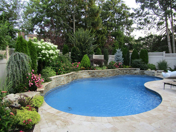 Custom pool landscaping from by Paccione & Sons